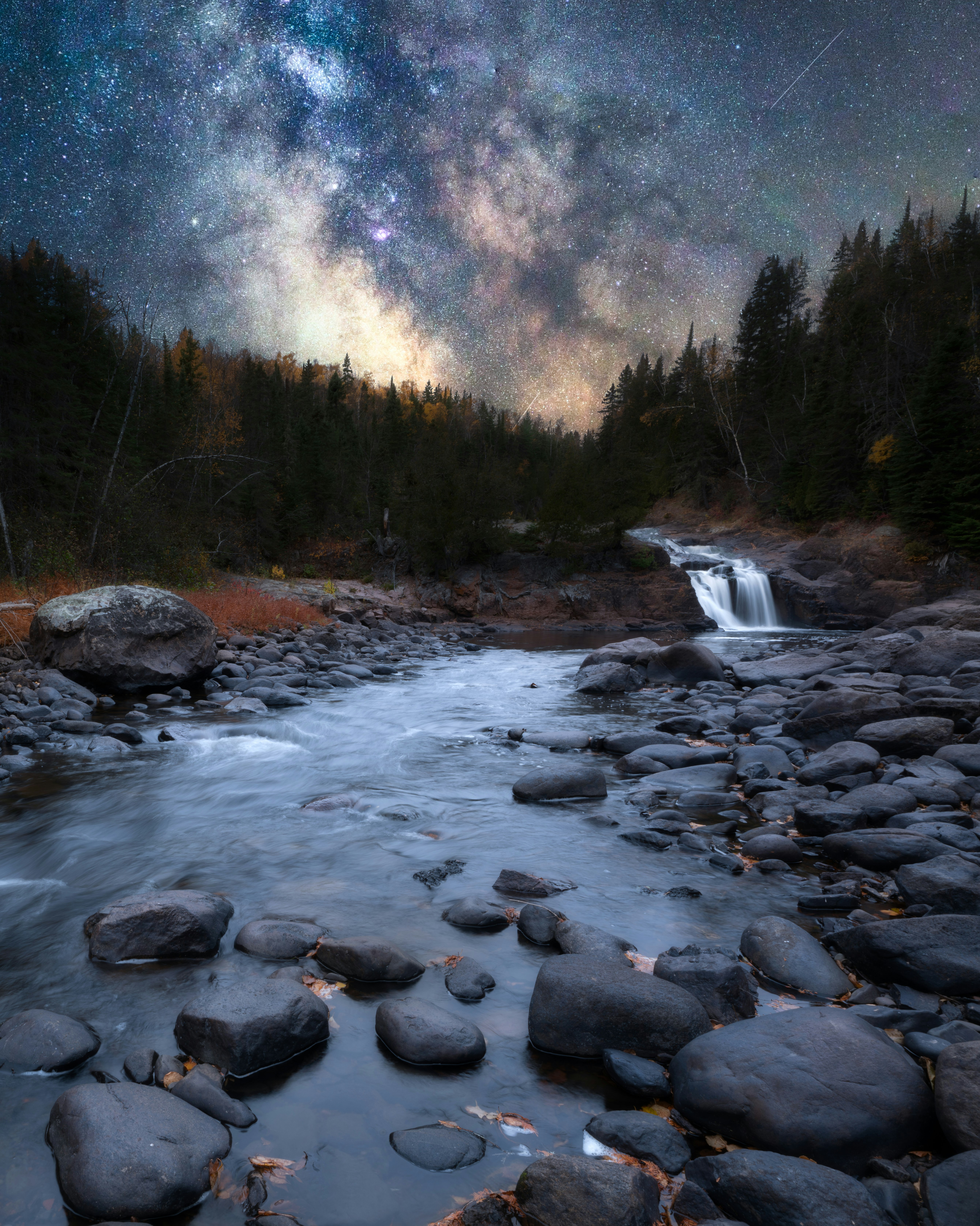 rocky river with rocks and trees